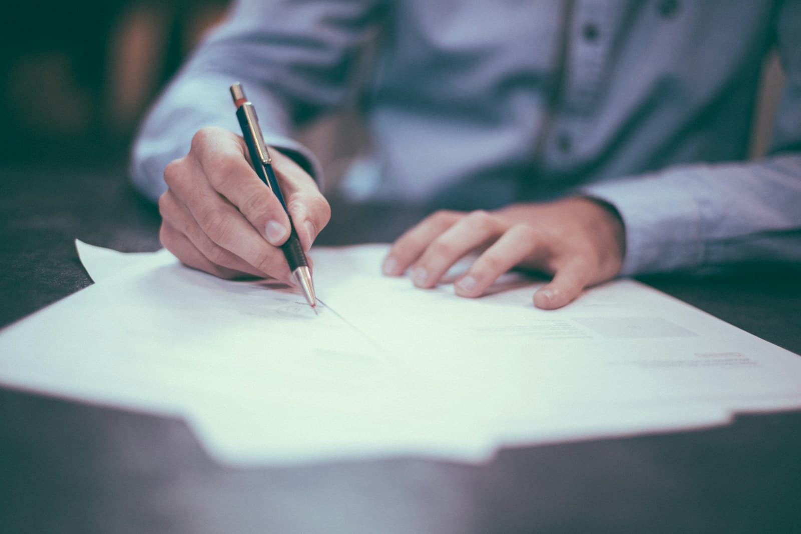 Professional reviewing and signing business documentation