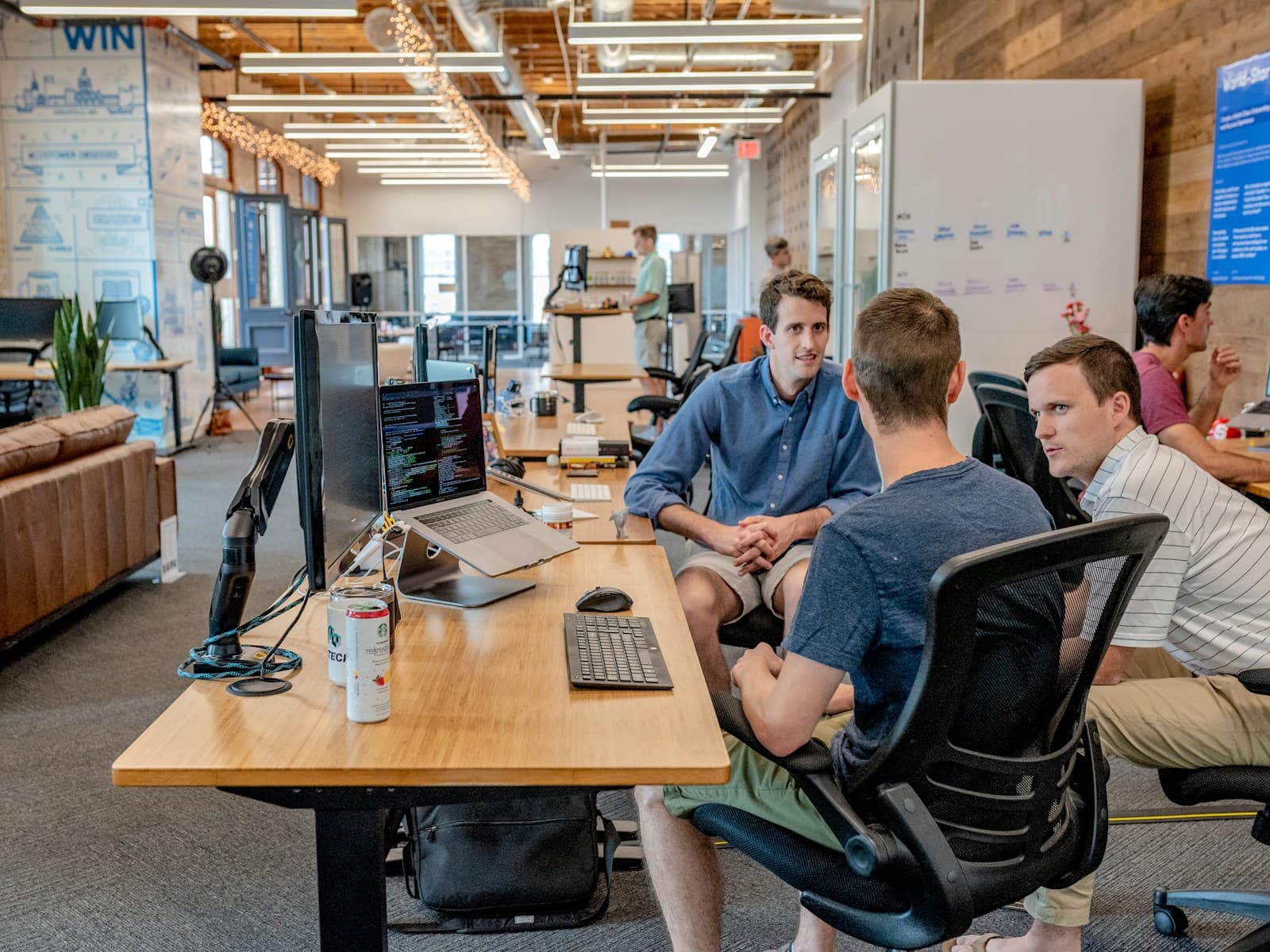 Business leaders discussing workforce plans in a modern office