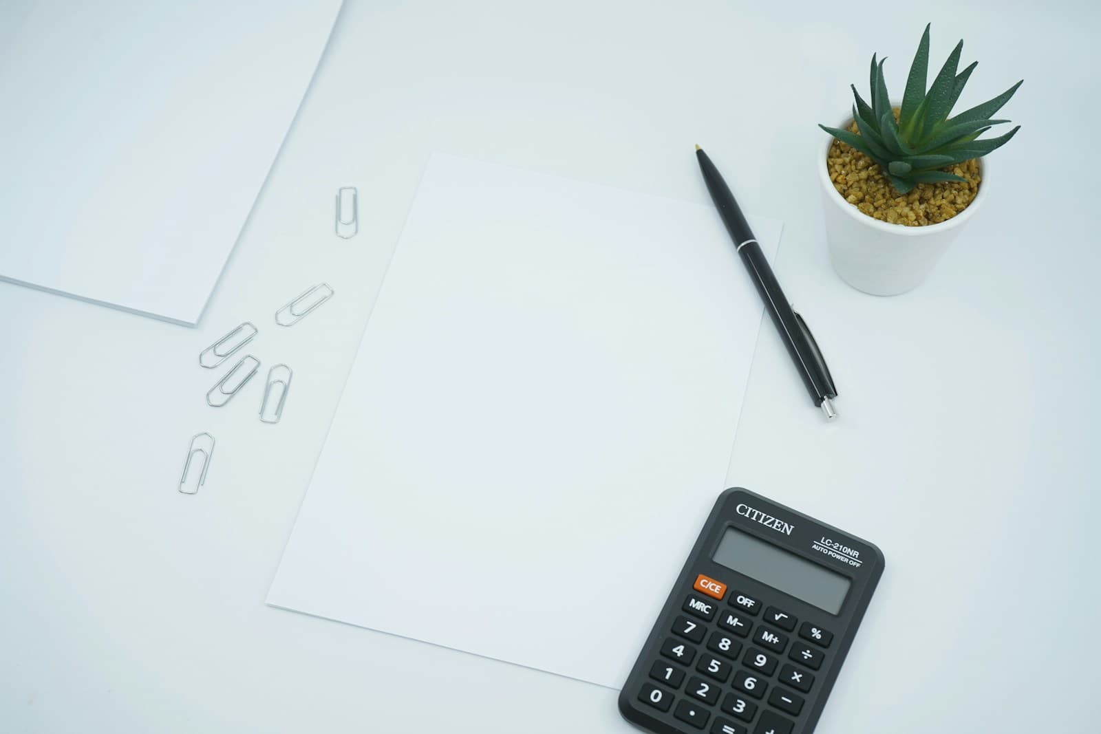 Calculator and financial documents ready for bookkeeping