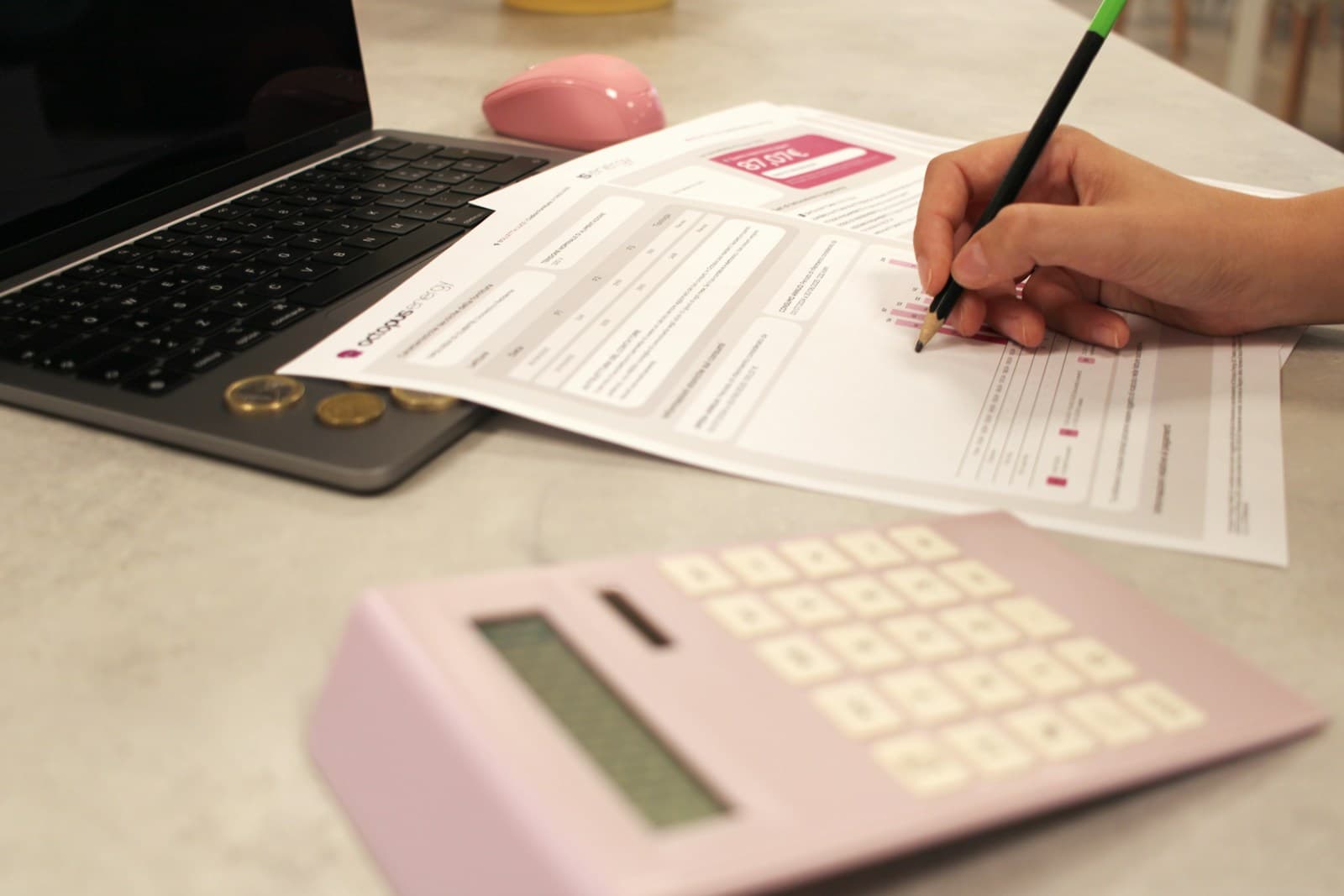 Business owner checking digital financial records and paperwork